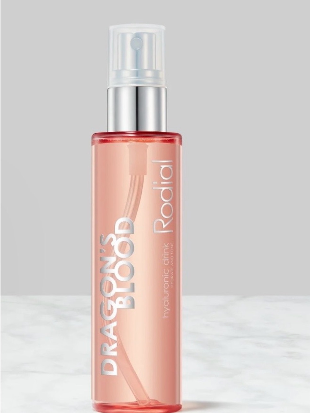 Rodial Dragon's Blood Spray Bottle in Peach Pink and Silver
